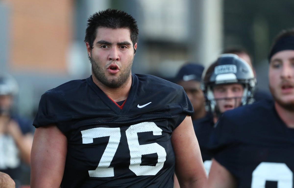 Virginia offensive lineman John Paul Flores at fall camp